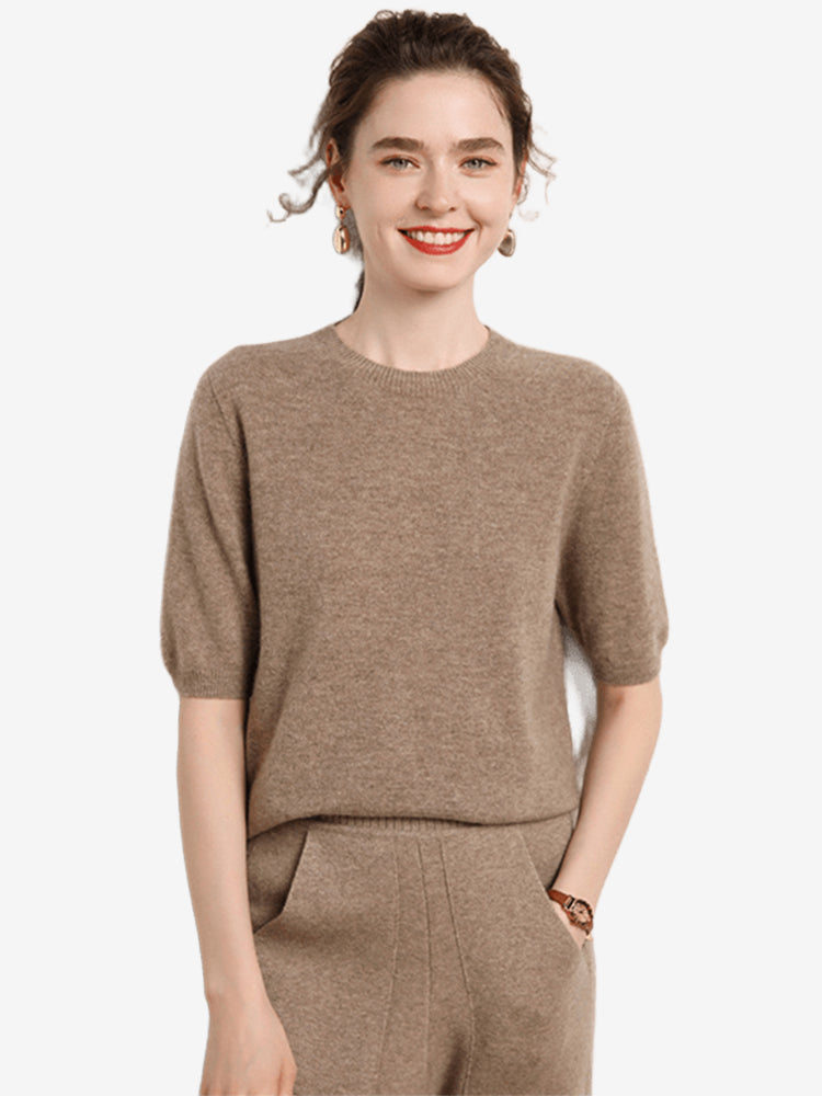 Model wearing LANLY Women's Short Sleeve Cashmere Sweater in Taupe