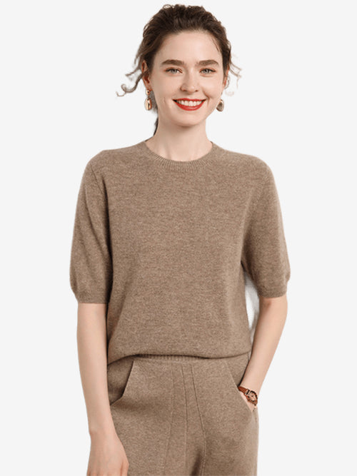 Model wearing LANLY Women's Short Sleeve Cashmere Sweater in Taupe